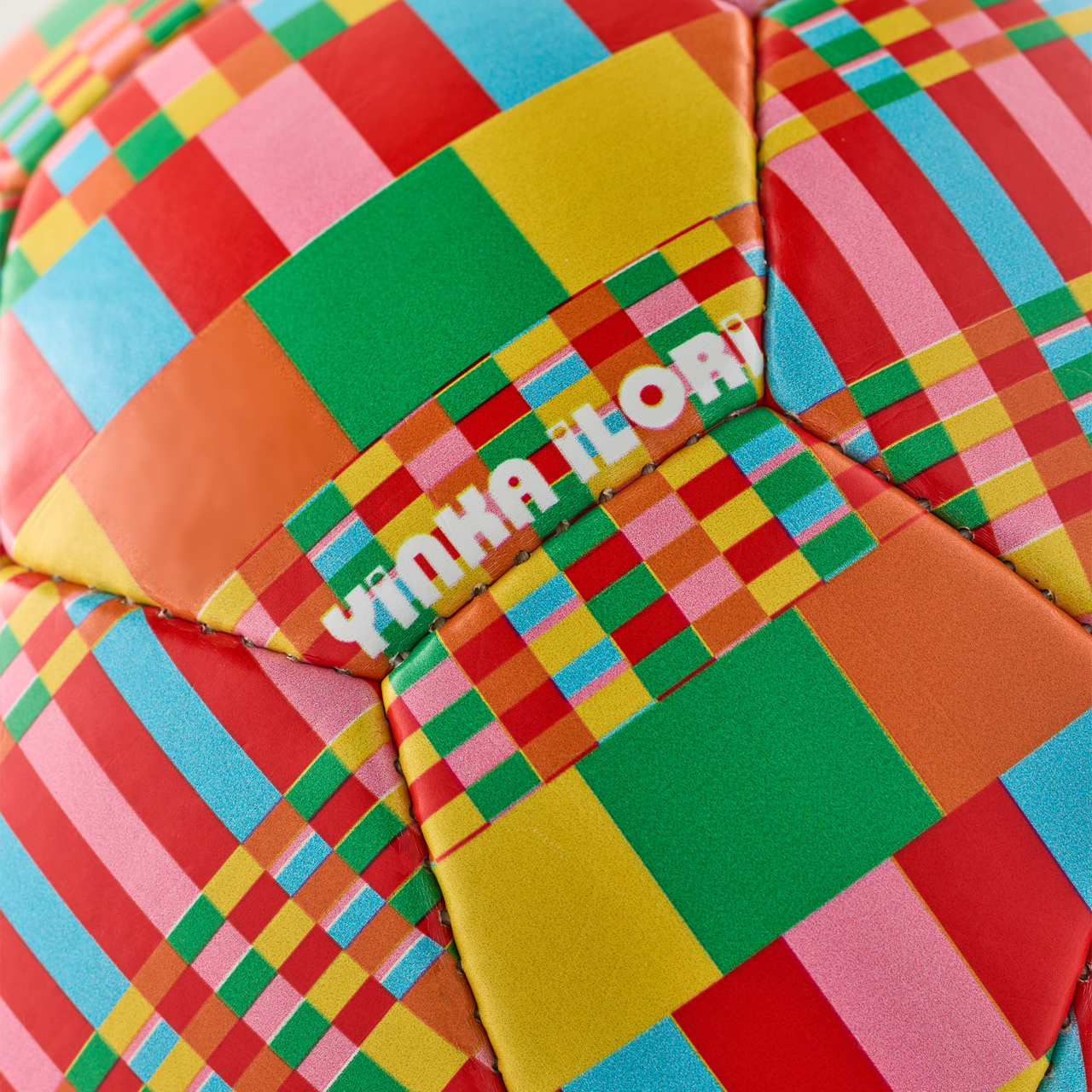 Colourful printed football with Yinka Ilori Objects branding