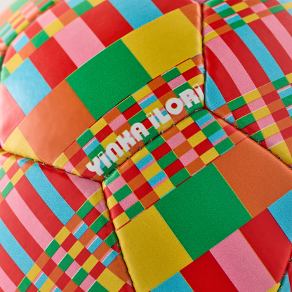 Colourful printed football with Yinka Ilori Objects branding