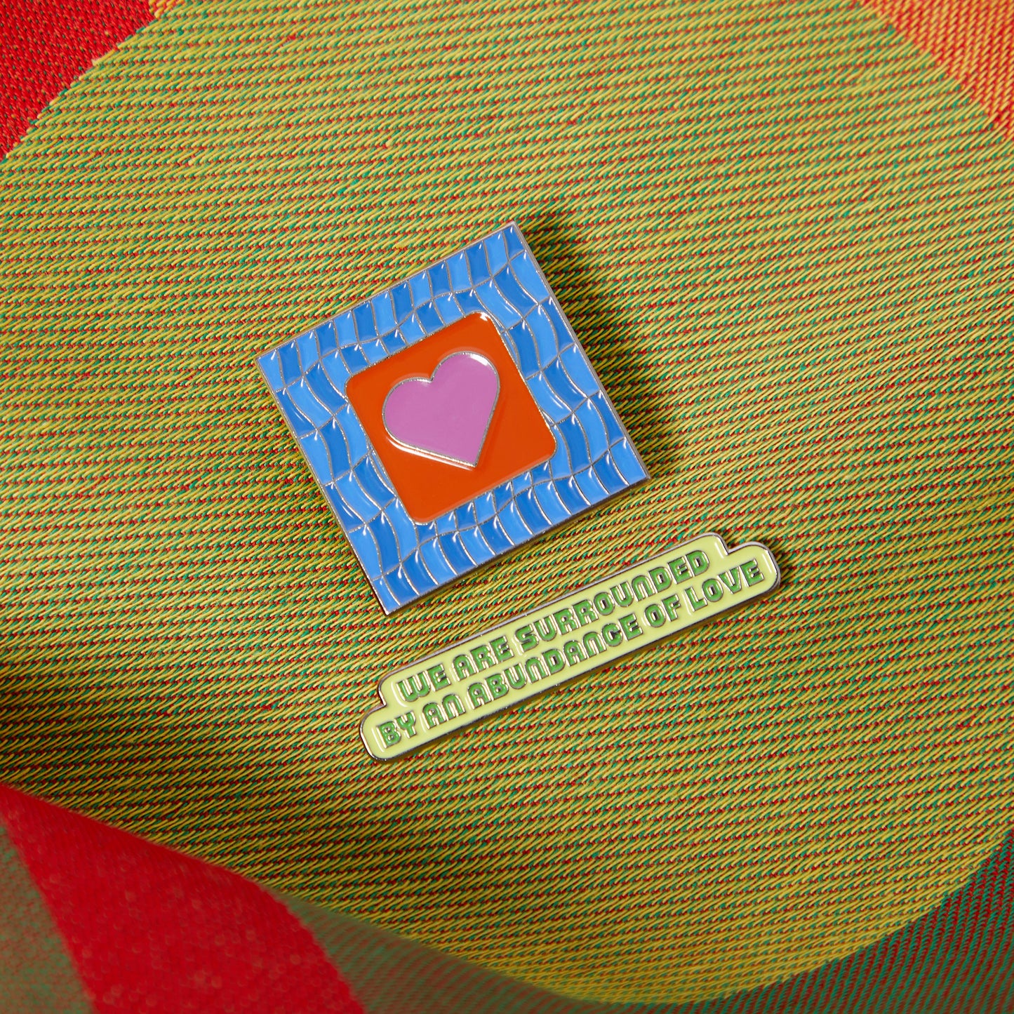 WE ARE SURROUNDED BY AN ABUNDANCE OF LOVE Enamel Pin Badge